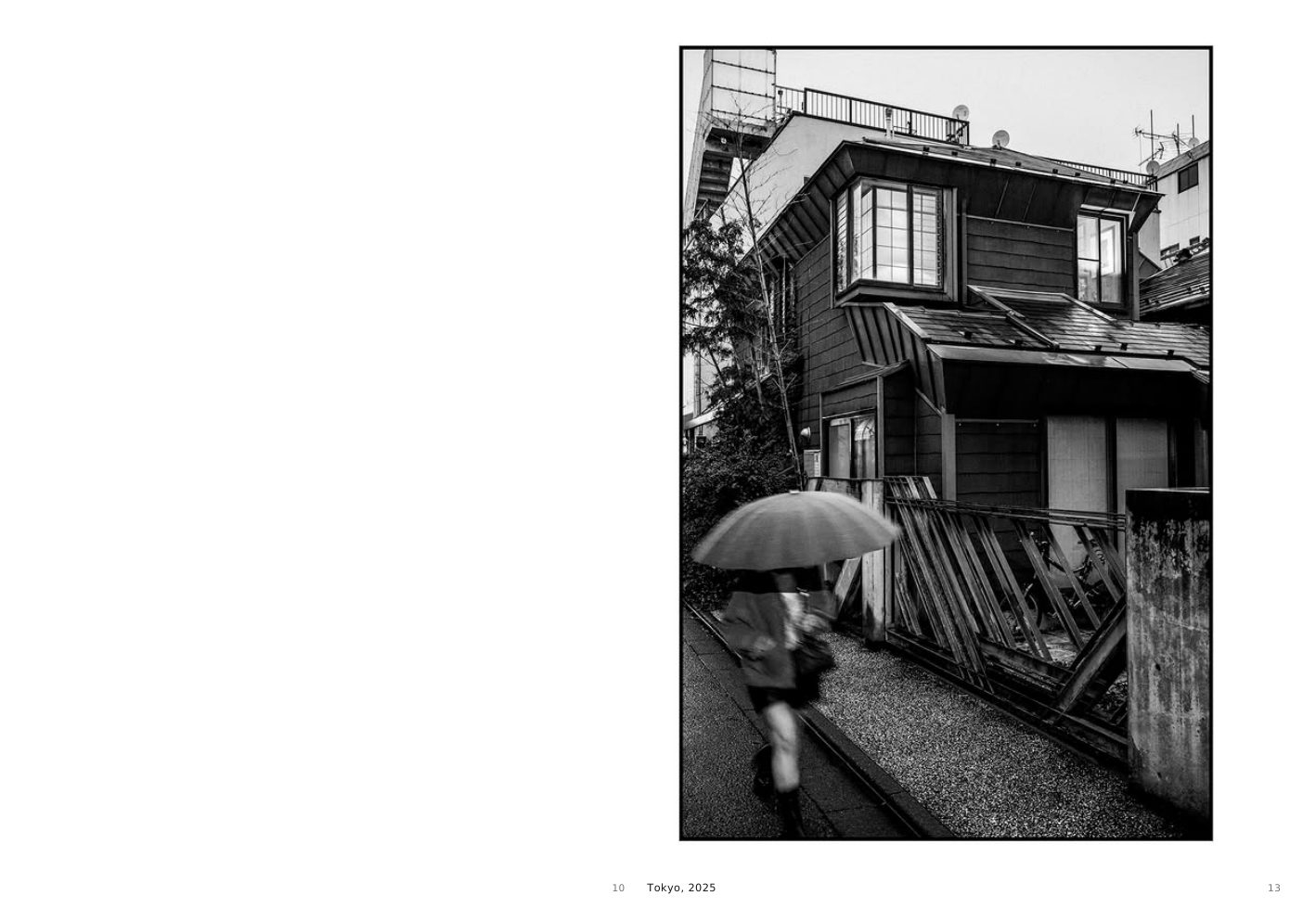 Tokyo, 2025, a black and white street scene with a figure beneath an umbrella